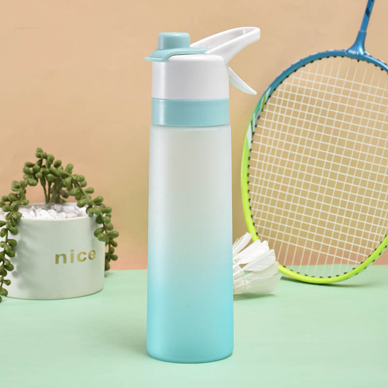 Gradient water bottle with a plant and badminton racket on a beige background