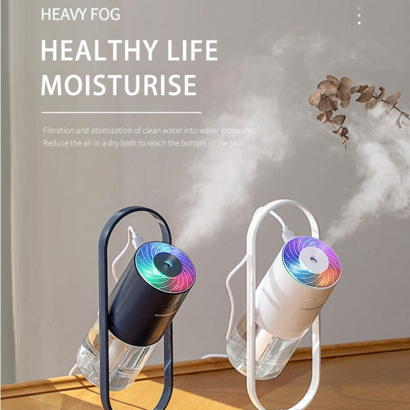 Two humidifiers emitting mist with text about healthy living and moisturizing.