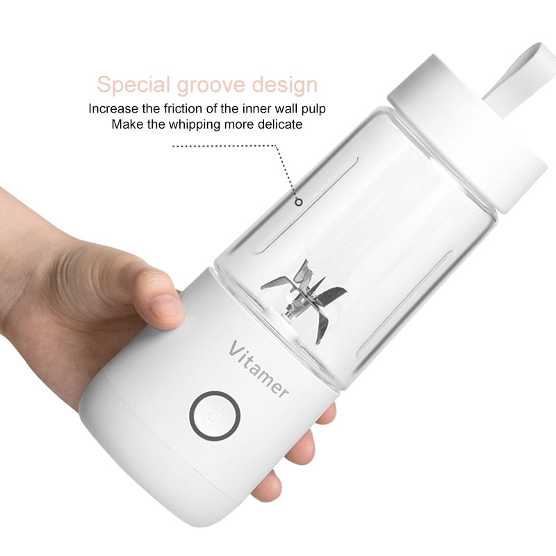 White bottle with a hand holding it, labeled 'Vitamer', on a white background.