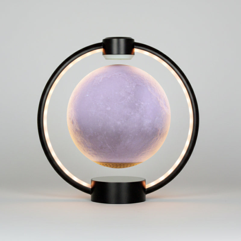 Moon lamp with black circular base and frame on a white background