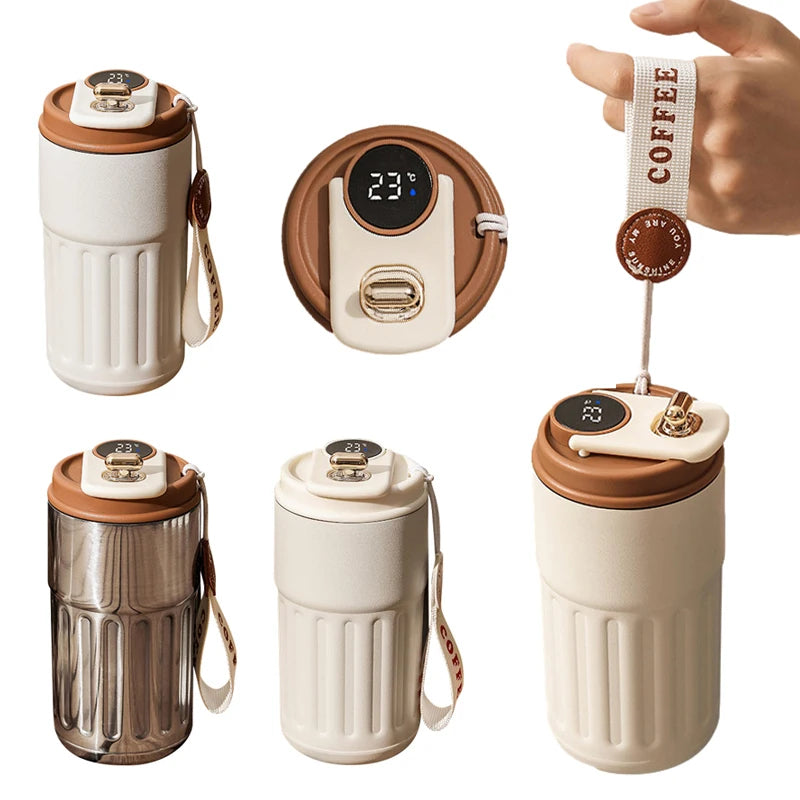 Collection of insulated travel mugs with digital thermometers and coffee-themed accessories on a white background.