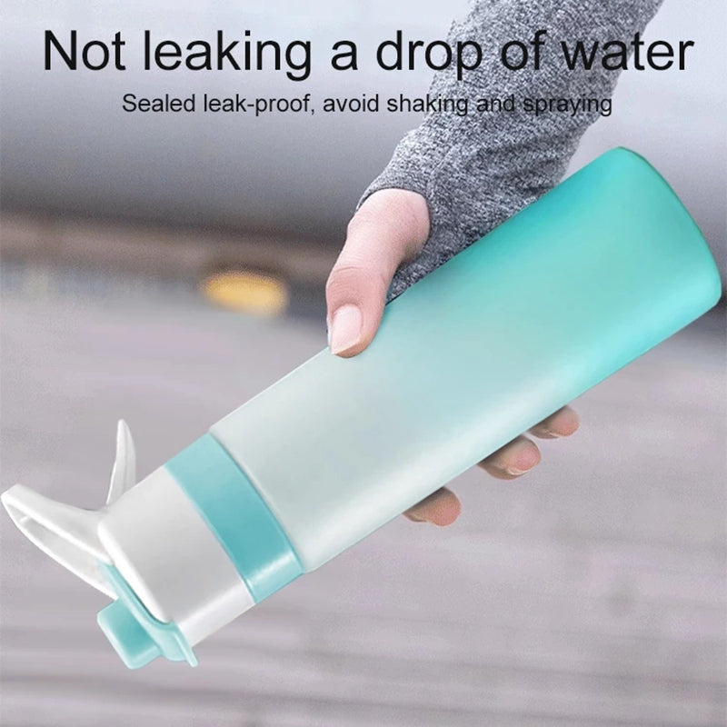 Hand holding a light blue and white device with text about water leakage prevention.