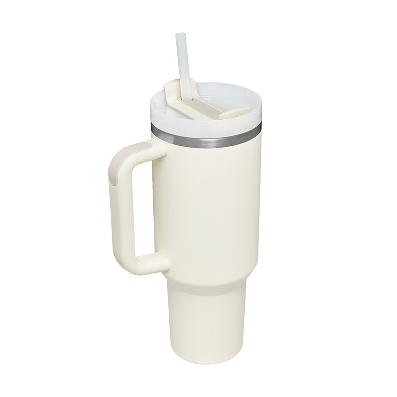 White tumbler with handle and straw on a white background