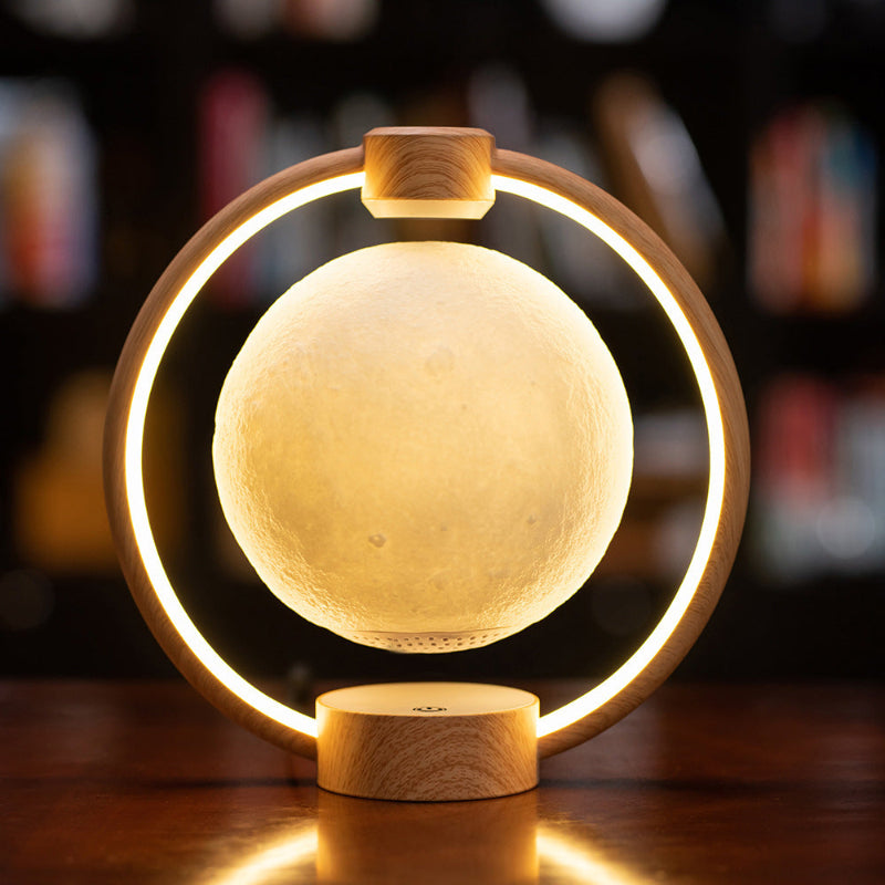 Decorative lamp with wooden base and circular light fixture on a blurred background