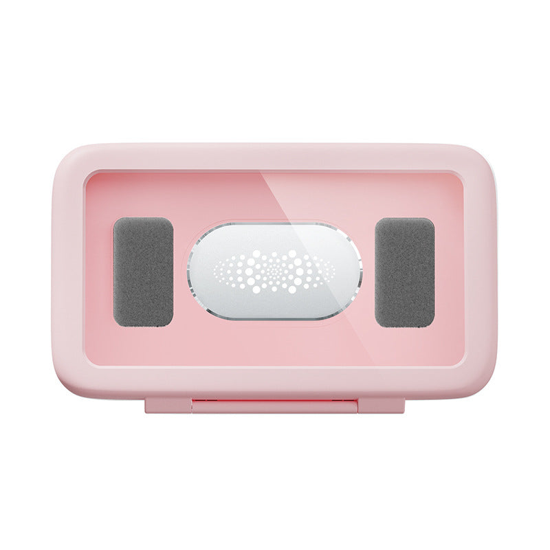 Pink electronic device with a central circular component on a white background