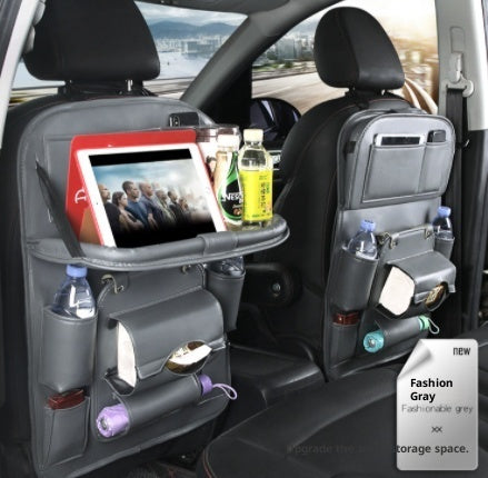 Car back seat organizer with tablet stand, drinks, and snacks in a vehicle.