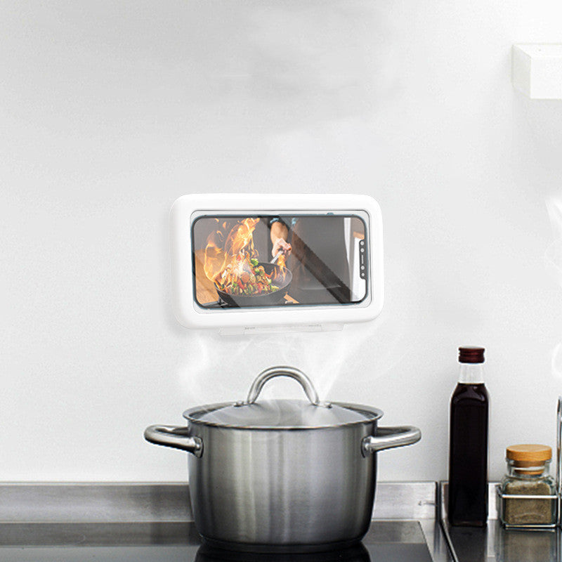 Stovetop with a pot and a small TV screen displaying flames and a knife.