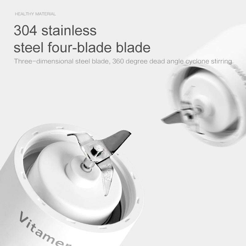 Stainless steel four-blade blade with Vitamer branding on a white background