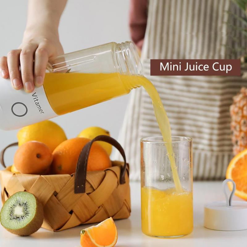 Person pouring orange juice from a mini juice cup into a glass, with fruits in the background.